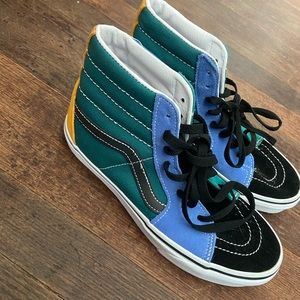 NWOT Multi Color high top vans.